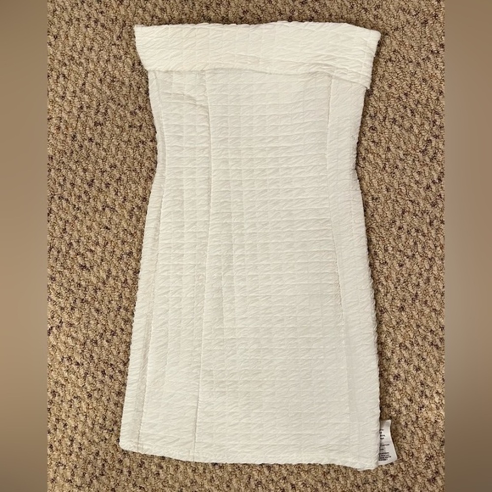White textured body con dress